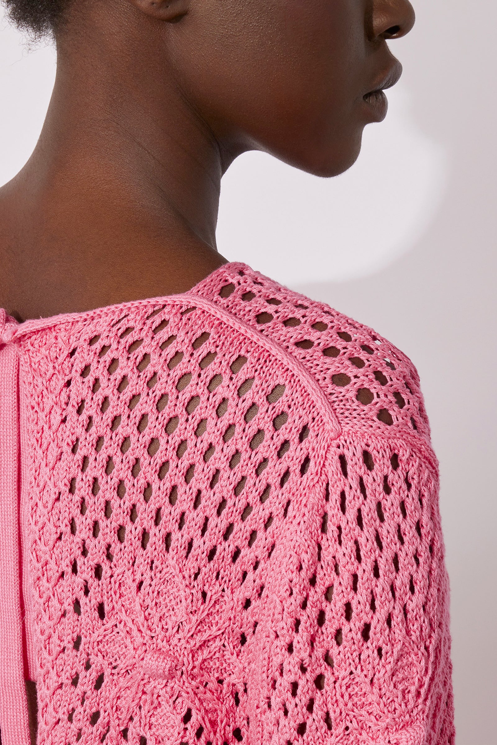 CREW-NECK SWEATER WITH NET STITCH AND FLOWERS